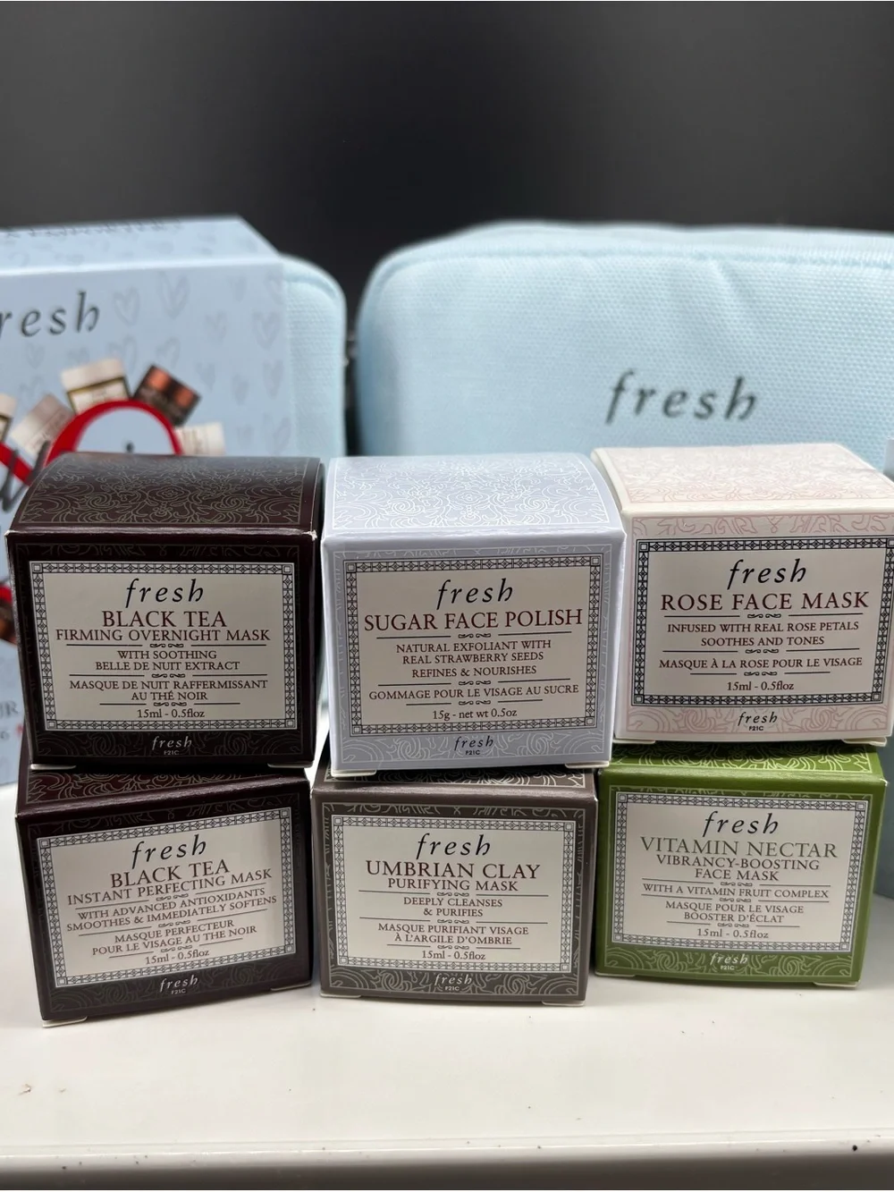fresh Mini Loves Light Blue Travel Pouch with 6 Skincare Masks